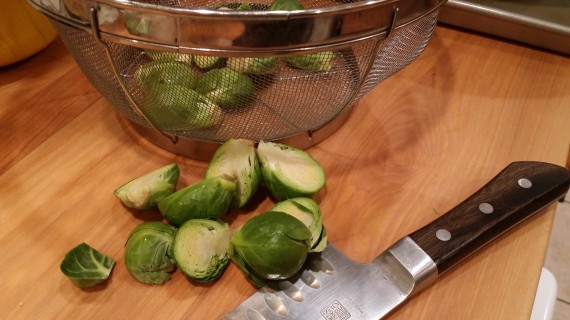 Cut the brussels sprouts in half.