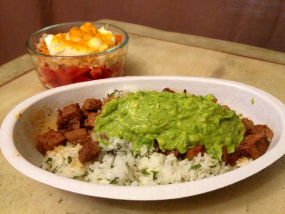 Chipotle Bowl with white rice, steak, and guacamole. 