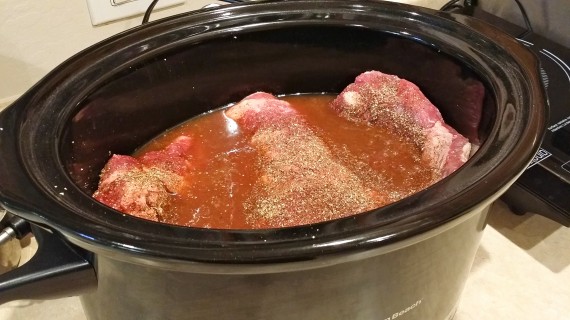 Do whatever it takes to get that brisket in the slow cooker. Shove it in.