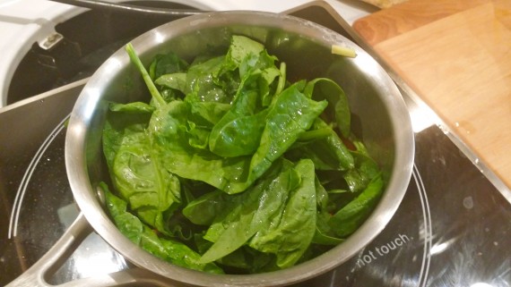 Spinach getting cooked for a quickie soup.