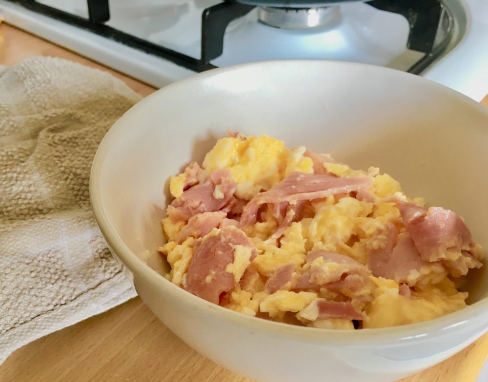 Scrambled eggs are a routine breakfast while traveling